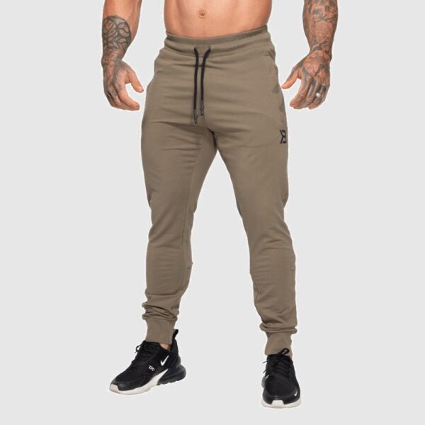 miesten housut tapered joggers
